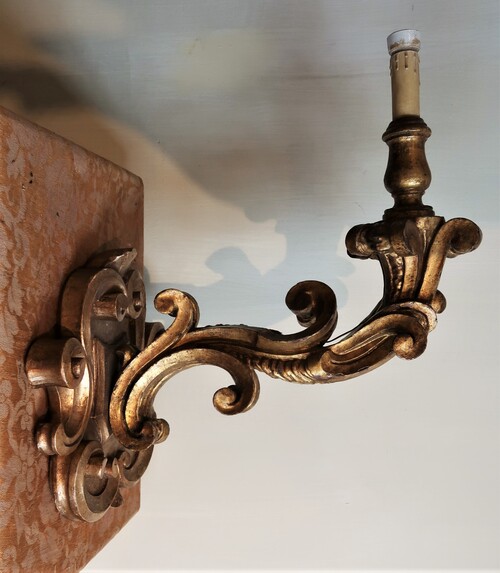 Pair of large baroque style wall lights