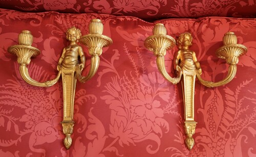 Pair of Louis XVI Style Wall Lights with the head of a cherub.