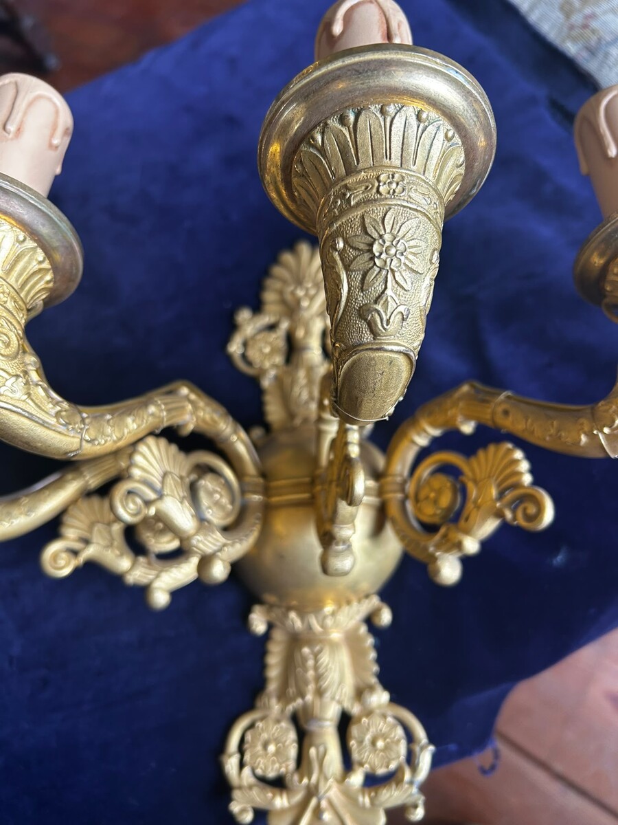 A three-light pair of french Restauration sconces