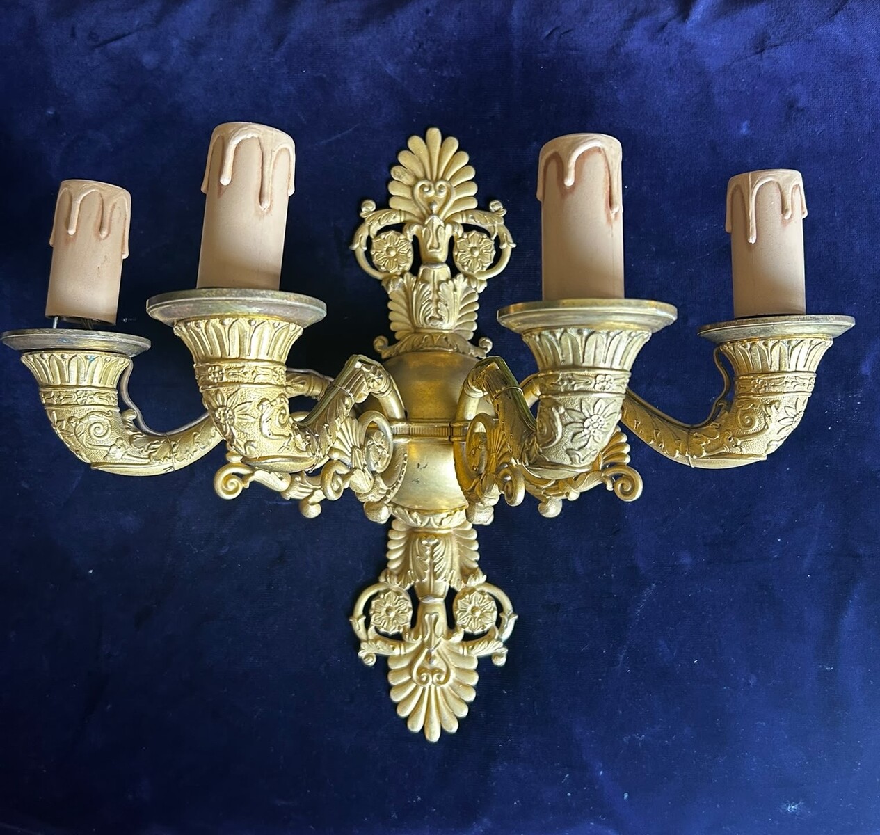 A three-light pair of french Restauration sconces