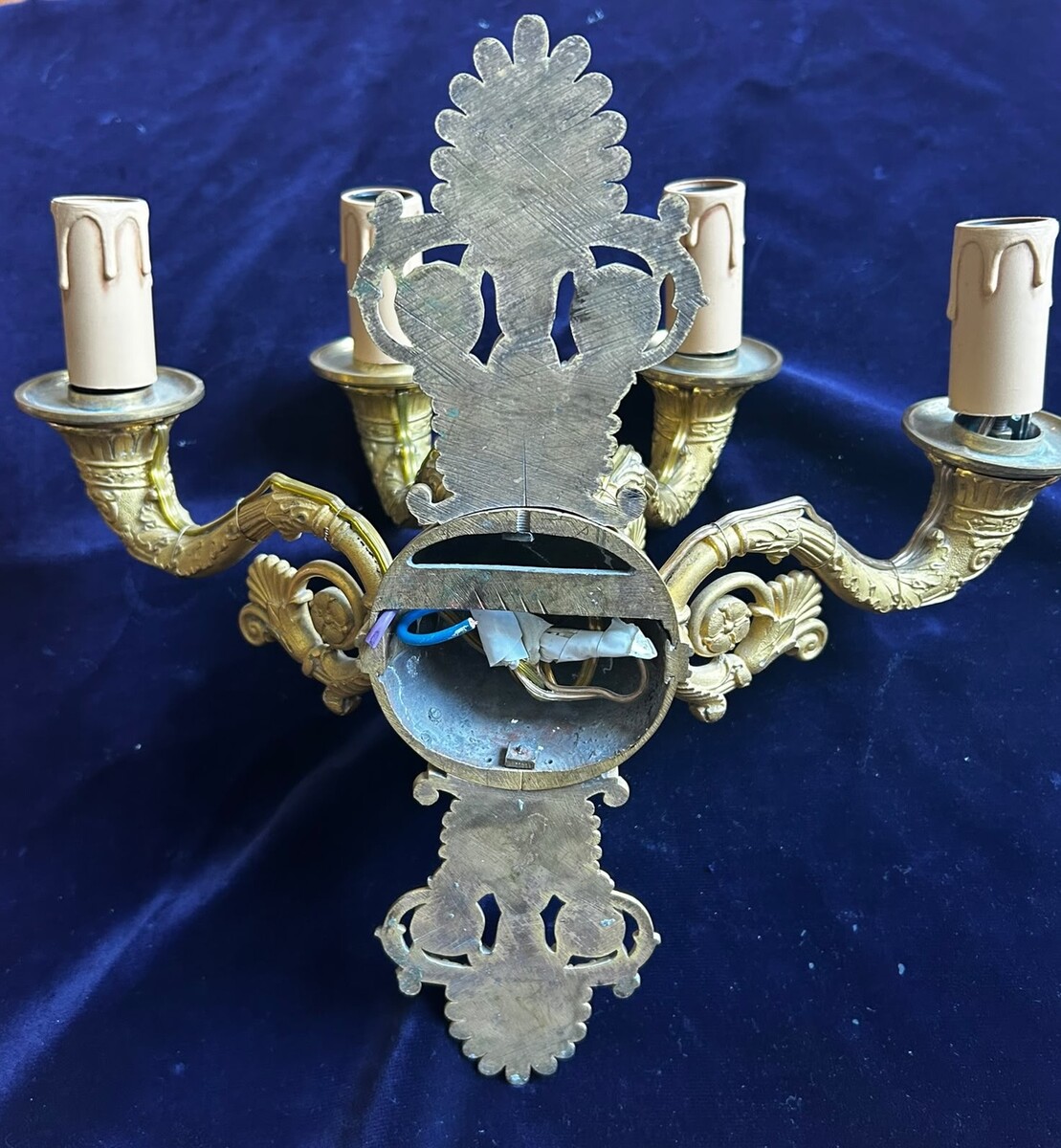 A three-light pair of french Restauration sconces