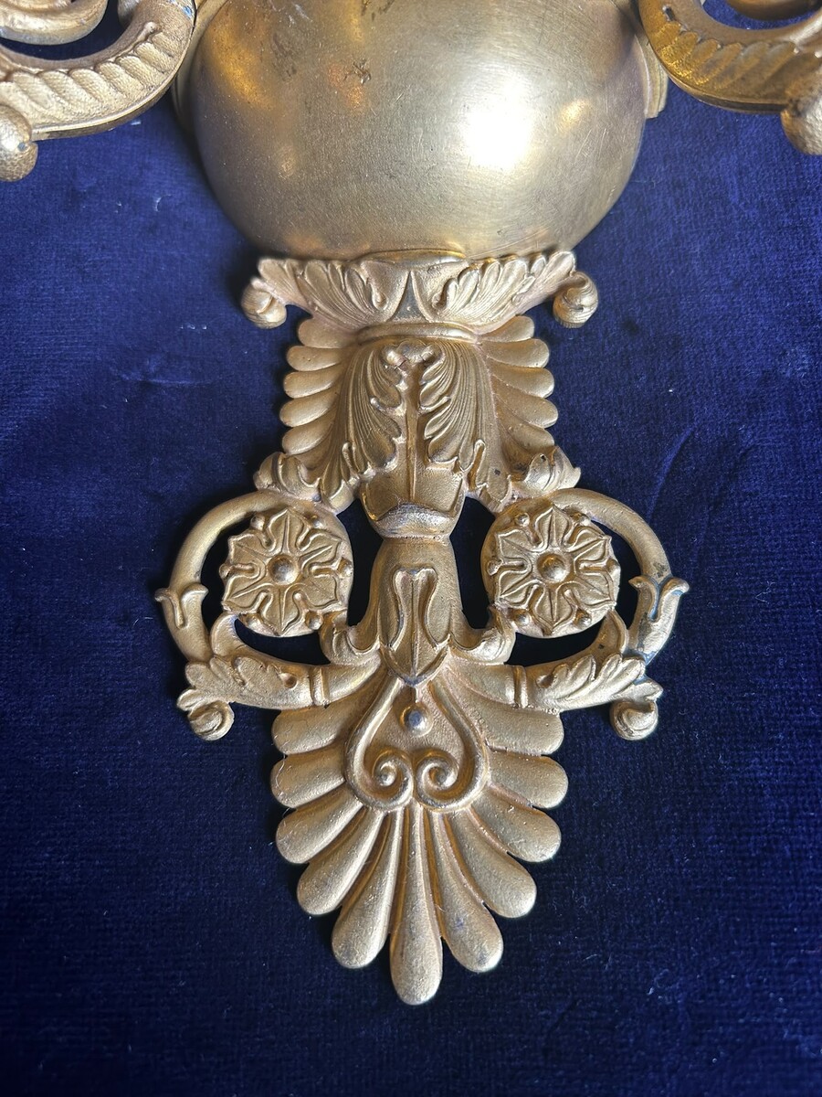 A three-light pair of french Restauration sconces