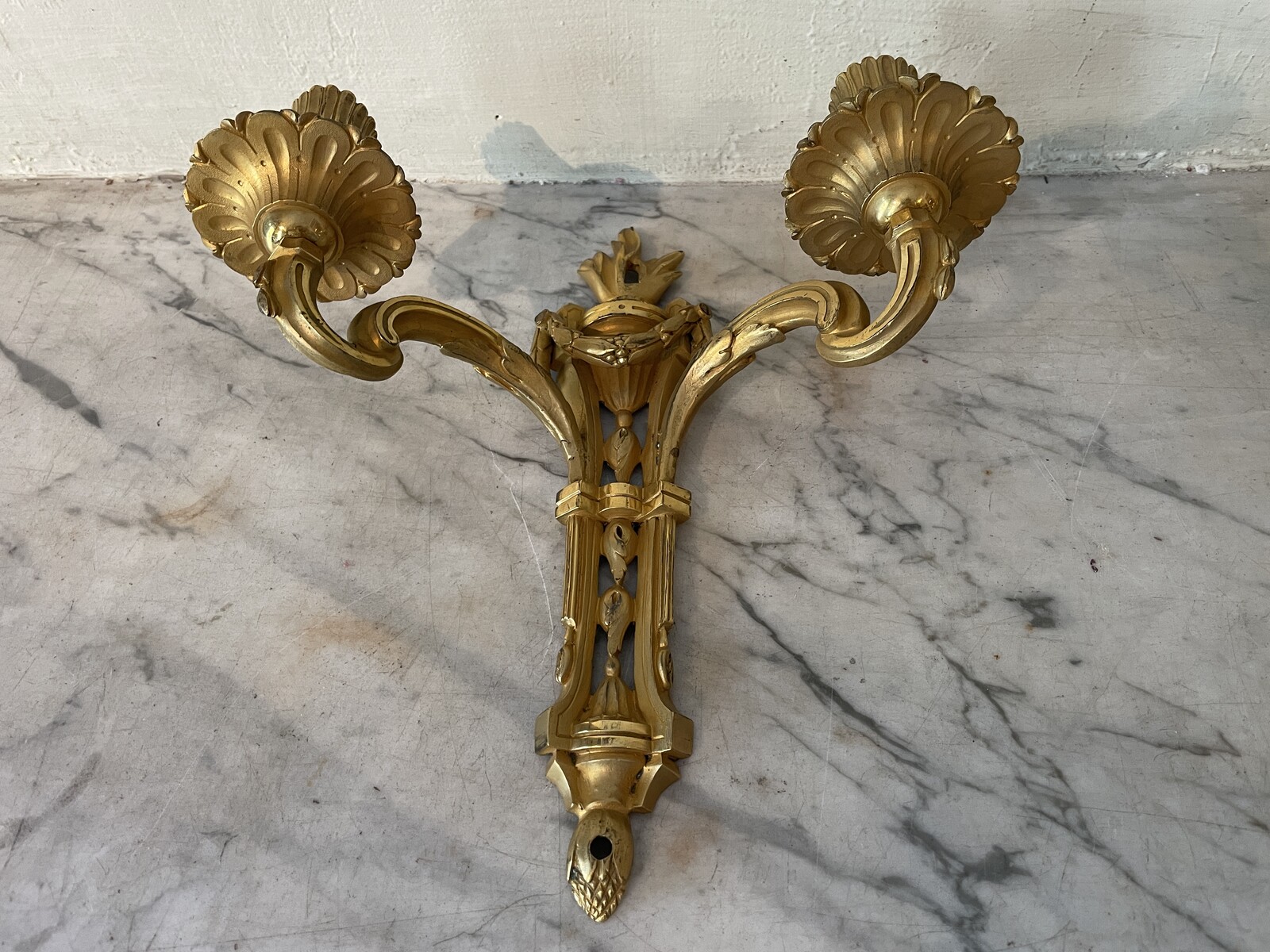 A two-light French Louis XVI period pair of sconces