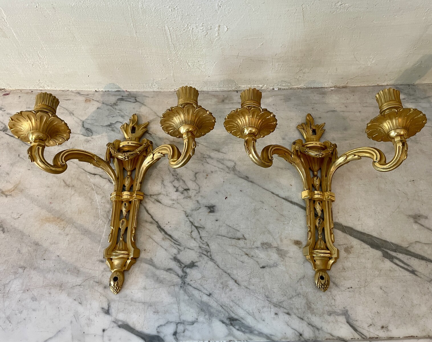 A two-light French Louis XVI period pair of sconces