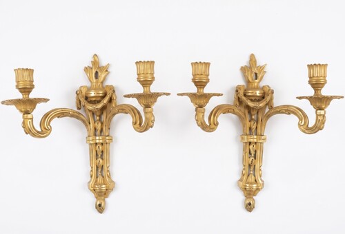 A two-light French Louis XVI period pair of sconces