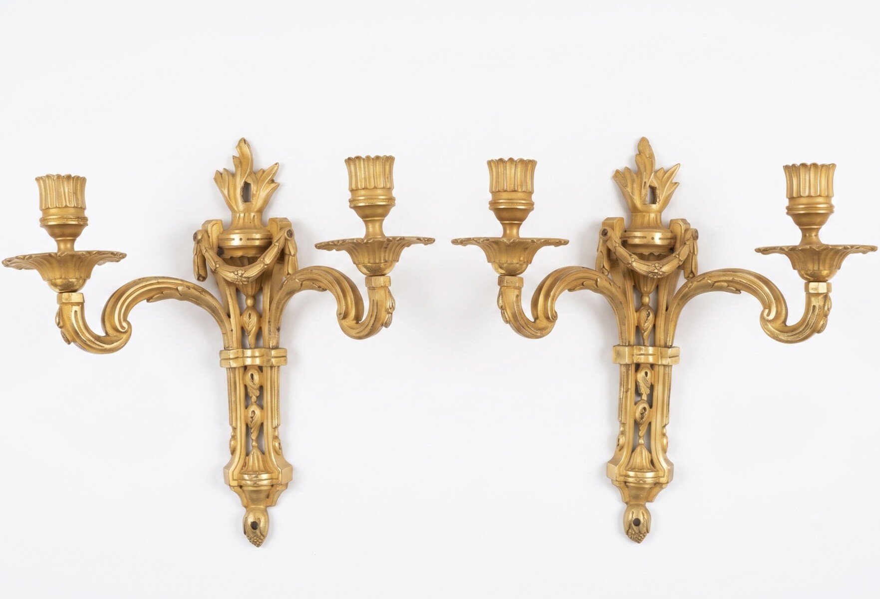 A two-light French Louis XVI period pair of sconces