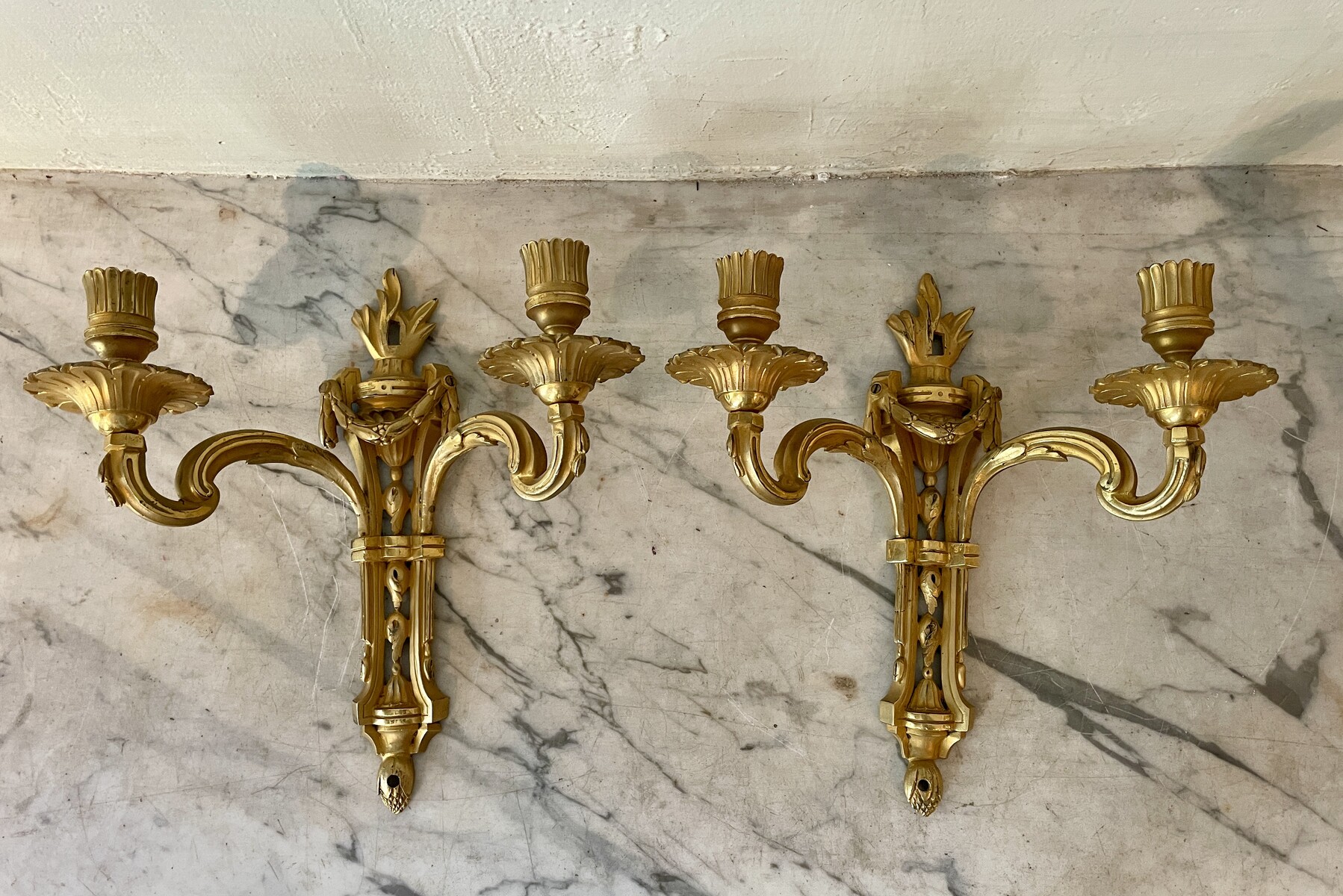 A two-light French Louis XVI period pair of sconces
