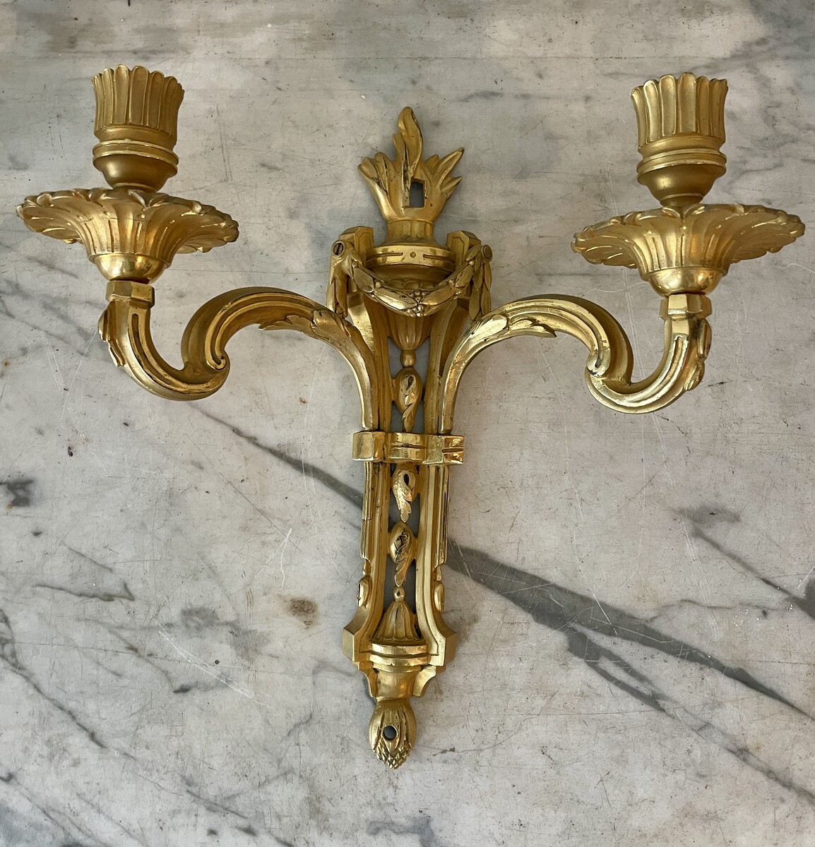 A two-light French Louis XVI period pair of sconces
