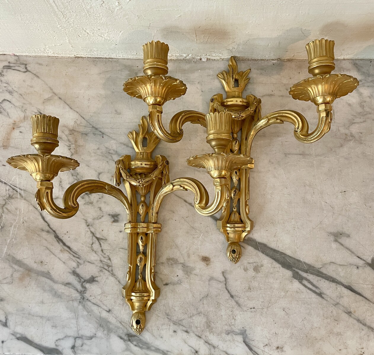 A two-light French Louis XVI period pair of sconces