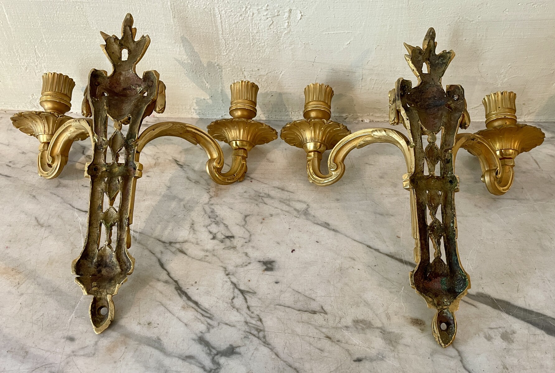 A two-light French Louis XVI period pair of sconces