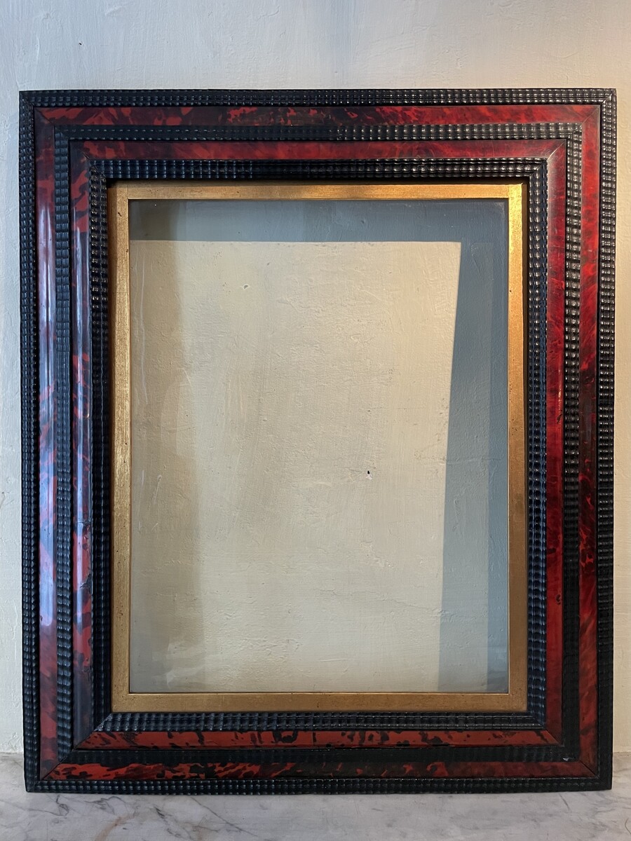 Antwerp style frame, includes an old glass