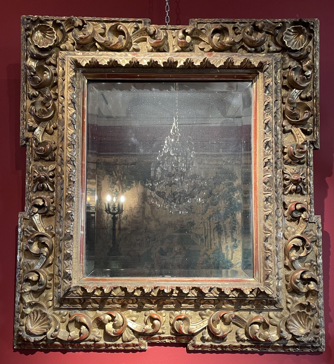 Baroque style mirror, the corners decorated with shells.