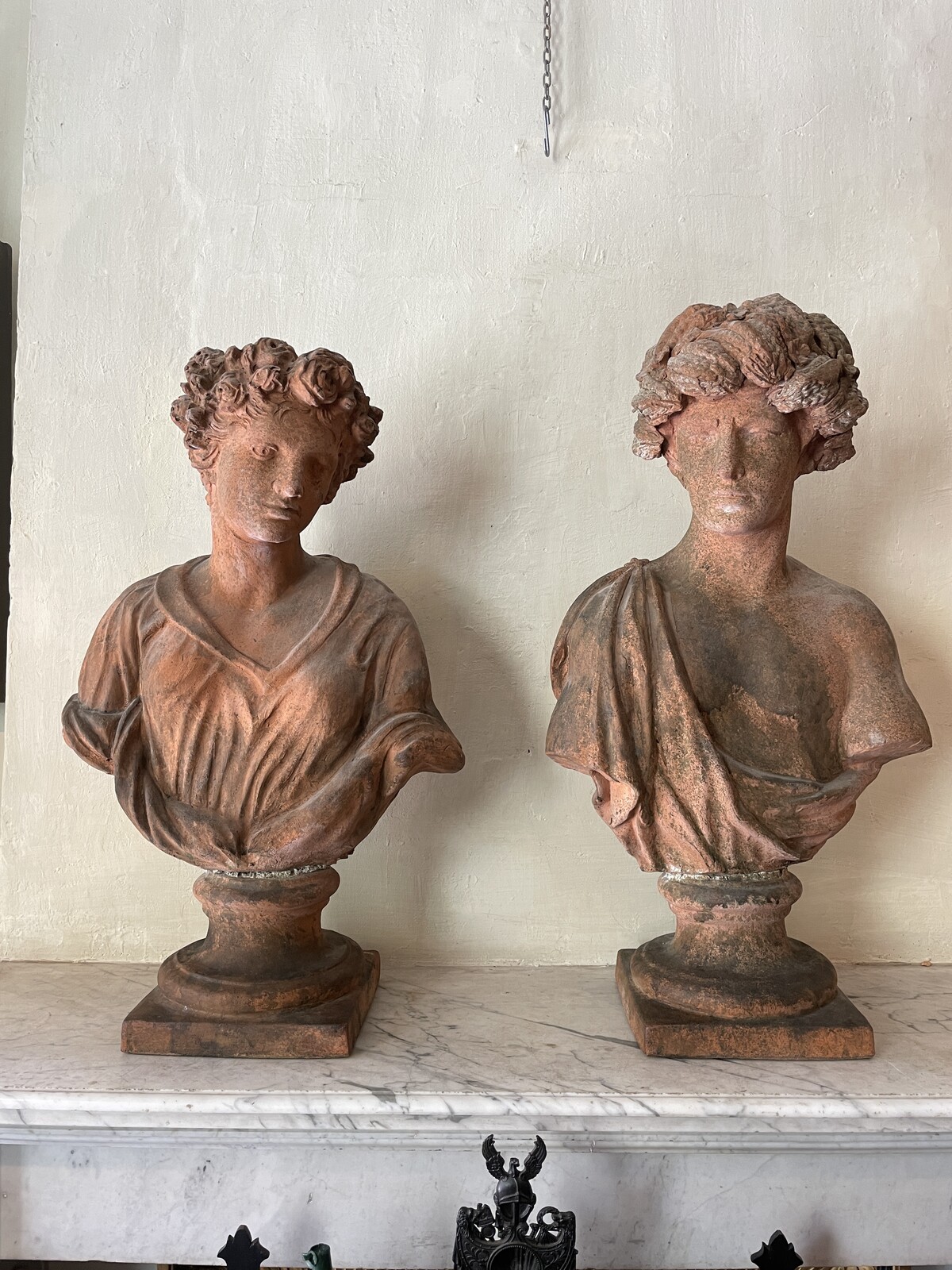 Couple of allegorical busts