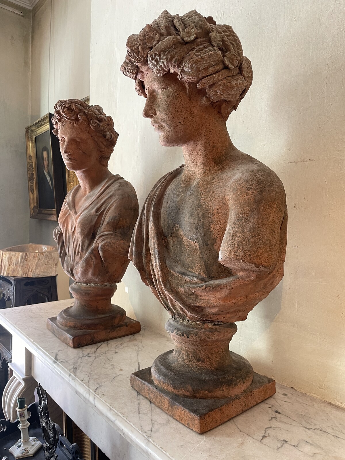 Couple of allegorical busts