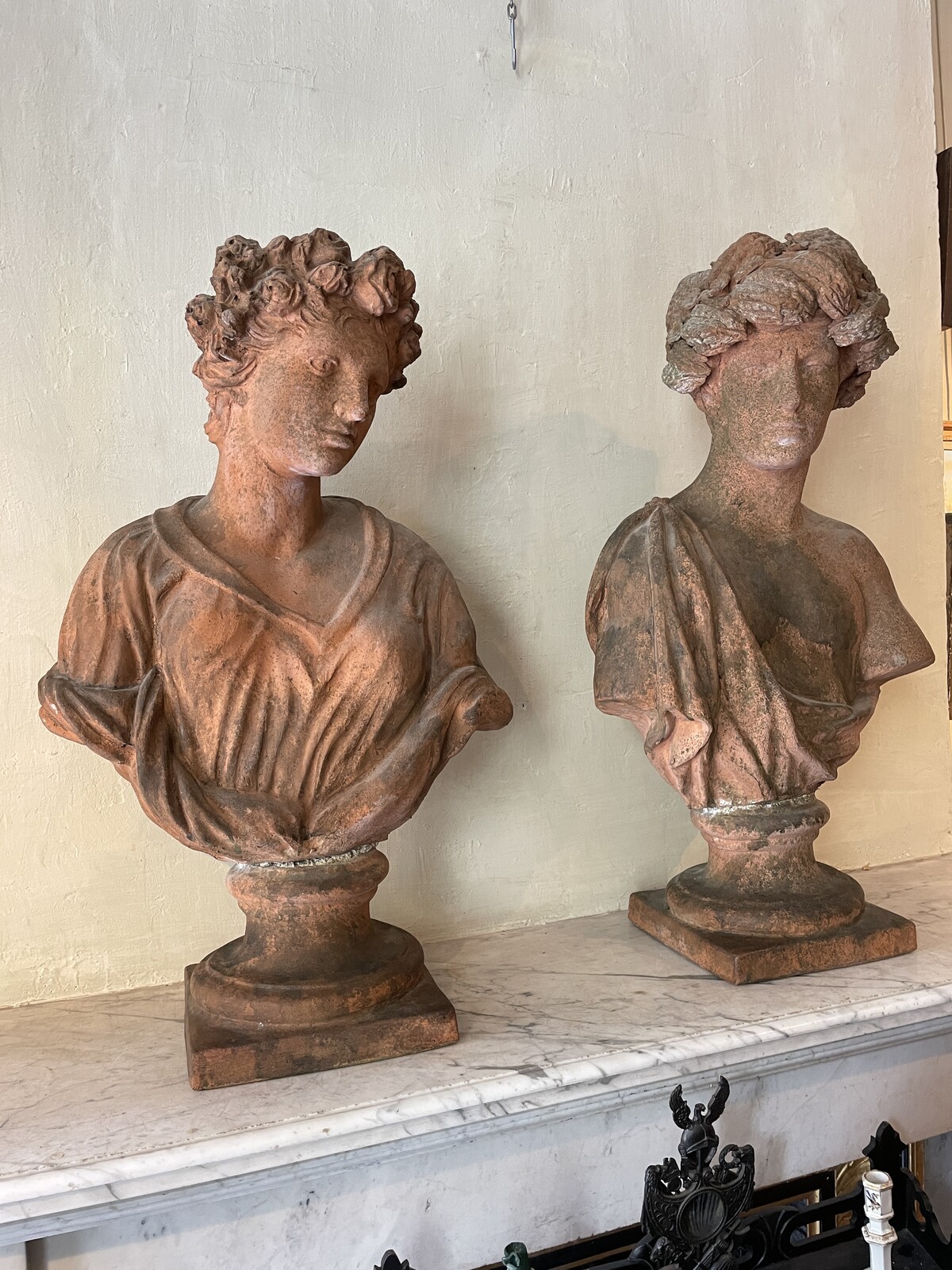 Couple of allegorical busts