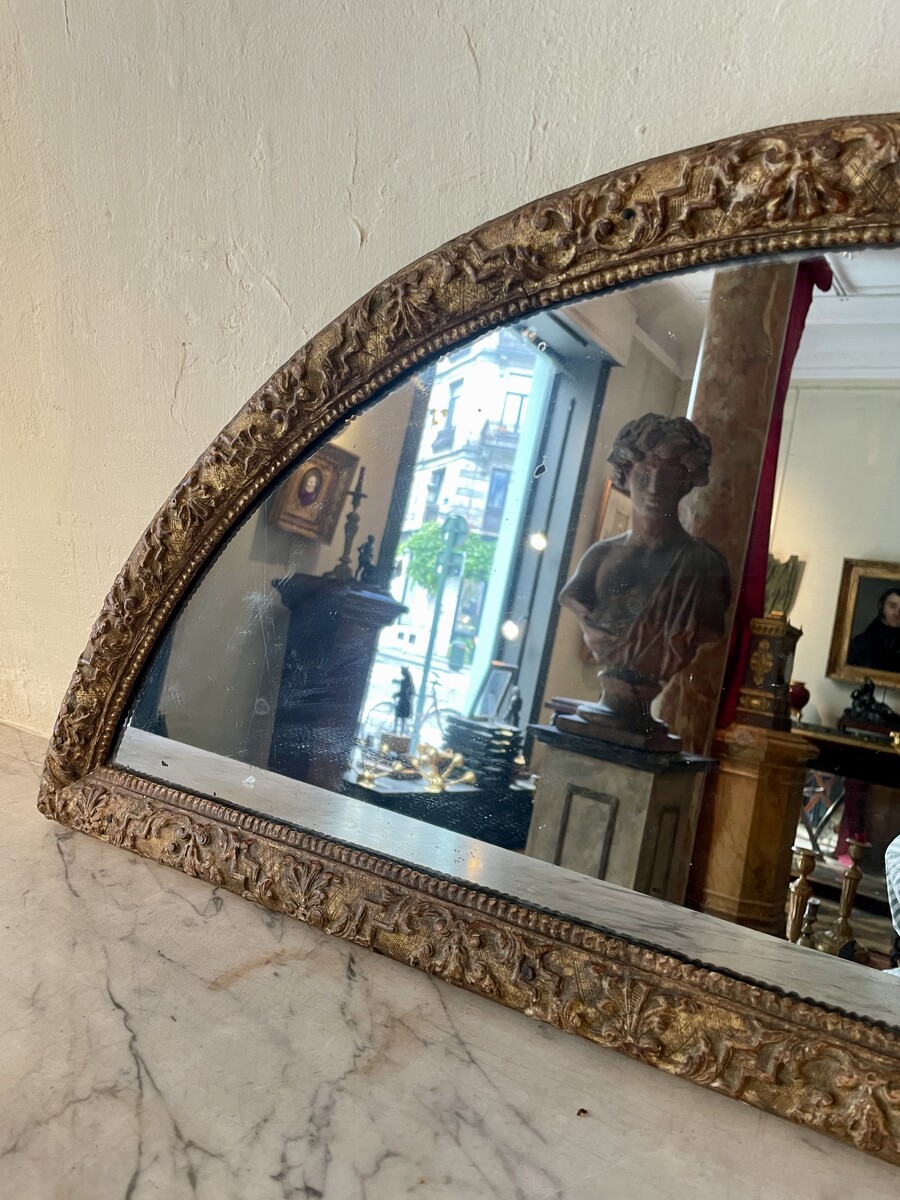 Half-moon-shaped mirror