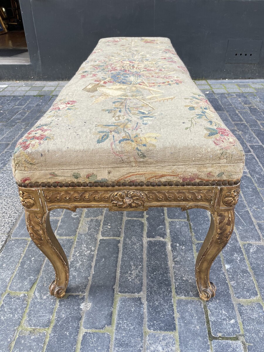 Large six-feet finely carved Louis XVI style bench covered with 18th century tapestry.