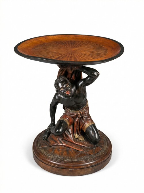 Moor-shaped gueridon supporting a carved circuar top