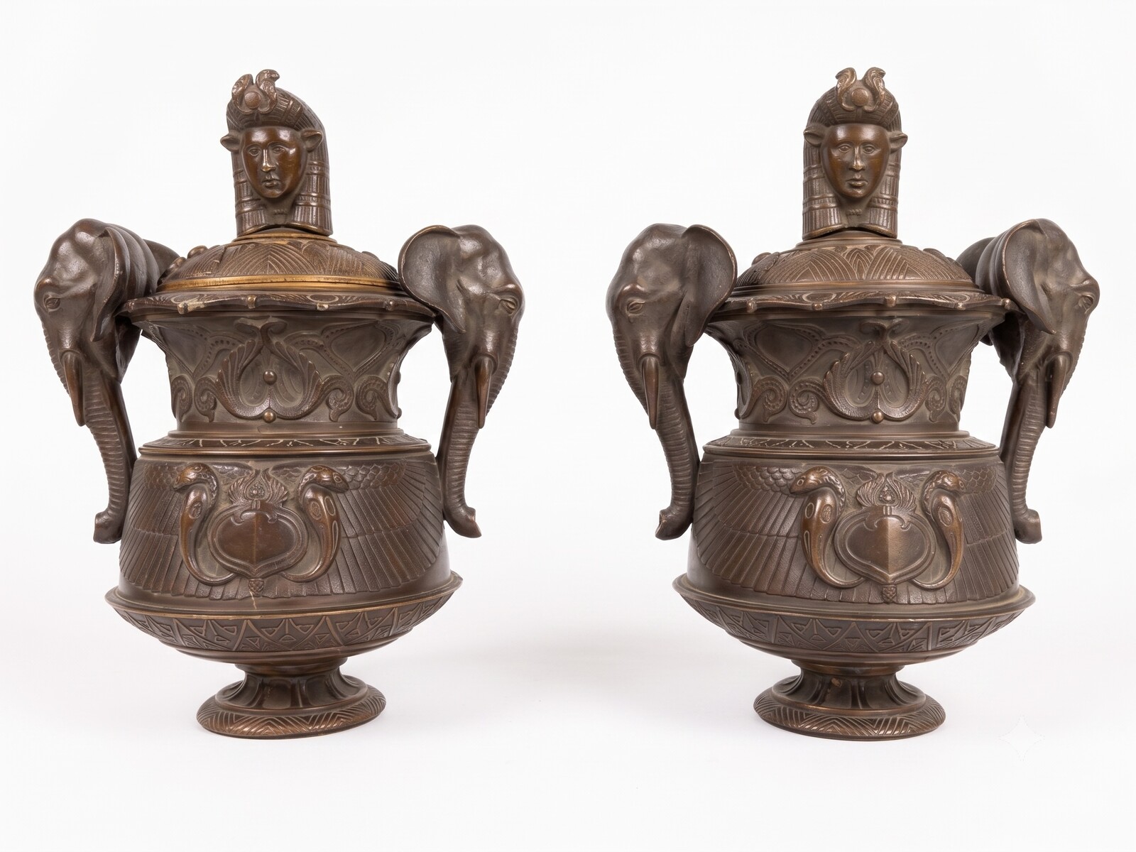 Pair of covered urns forming cigar holders