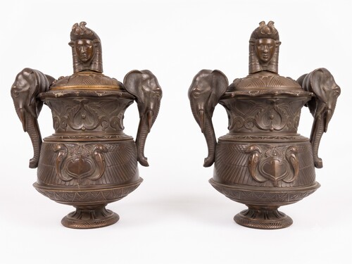 Pair of covered urns forming cigar holders