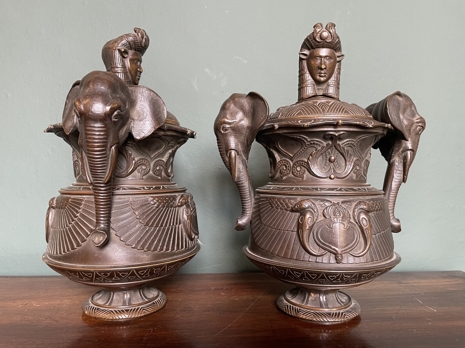 Pair of covered urns forming cigar holders
