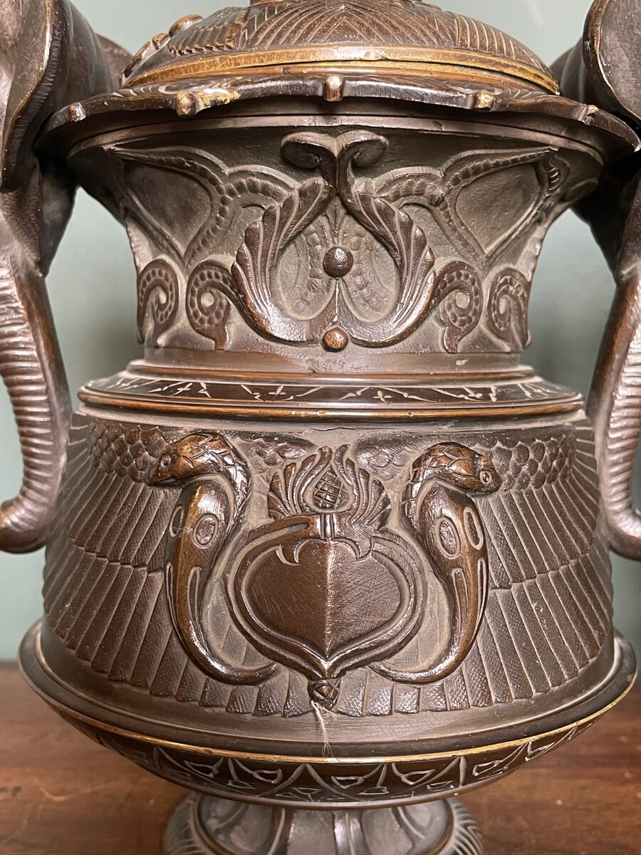 Pair of covered urns forming cigar holders, in the style of the return from Egypt