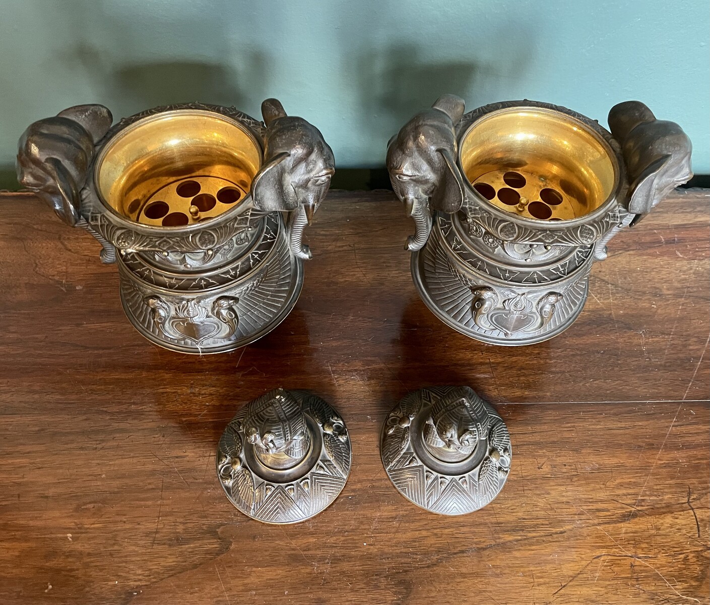 Pair of covered urns forming cigar holders, in the style of the return from Egypt