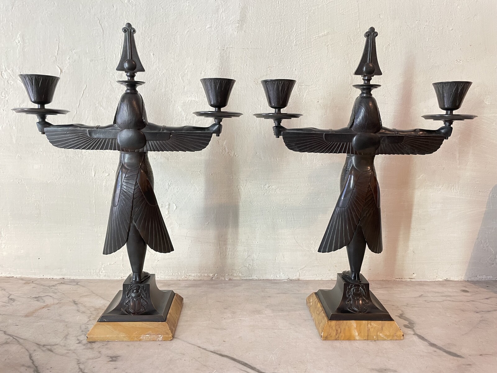 Pair of double candlesticks in the Egyptian revival style