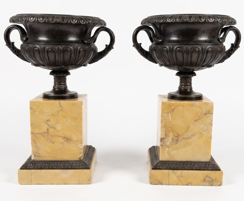 Pair of handle vases decorated with gadroons on base