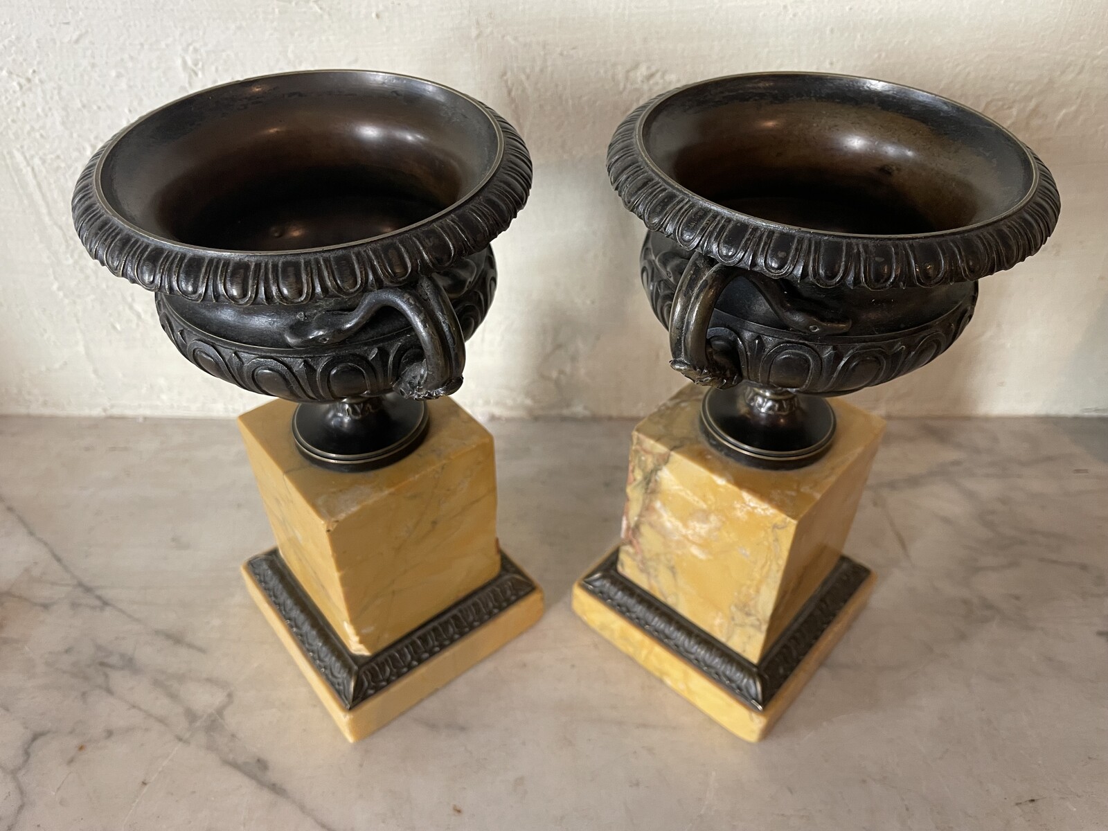 Pair of handle vases decorated with gadroons on base