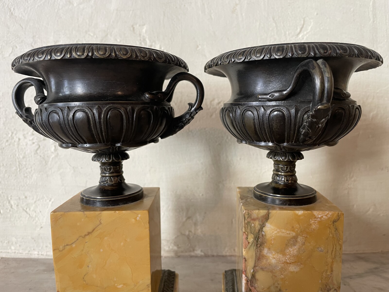 Pair of handle vases decorated with gadroons on base