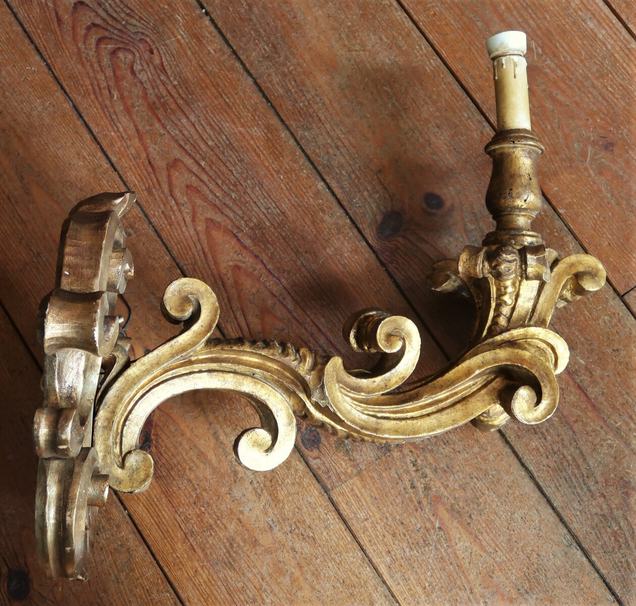 Pair of large baroque style wall lights