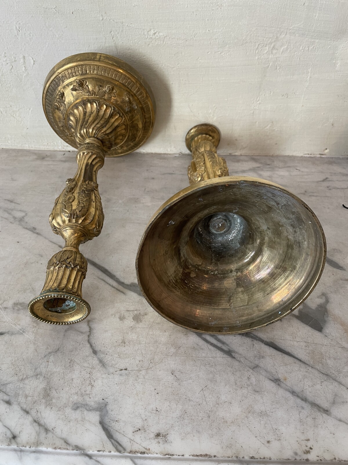 Pair of Louis XVI candlesticks with floral decoration.