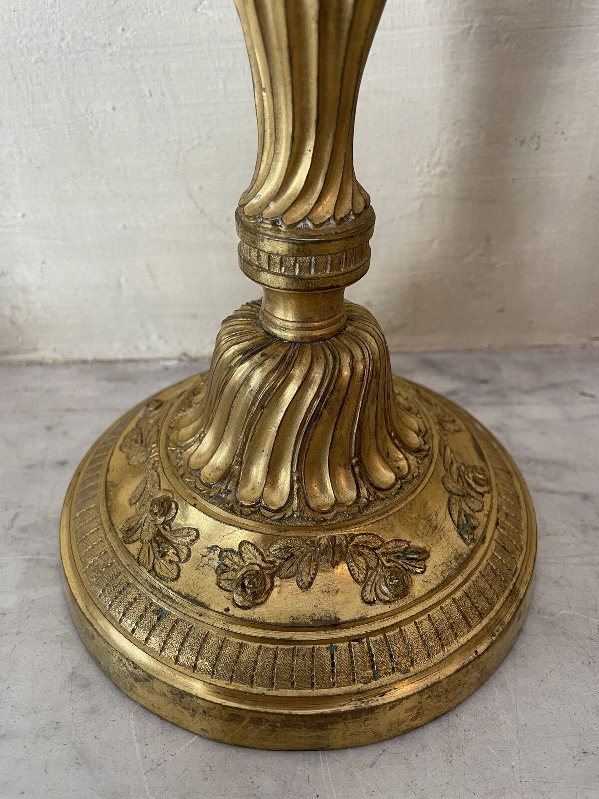 Pair of Louis XVI candlesticks with floral decoration.