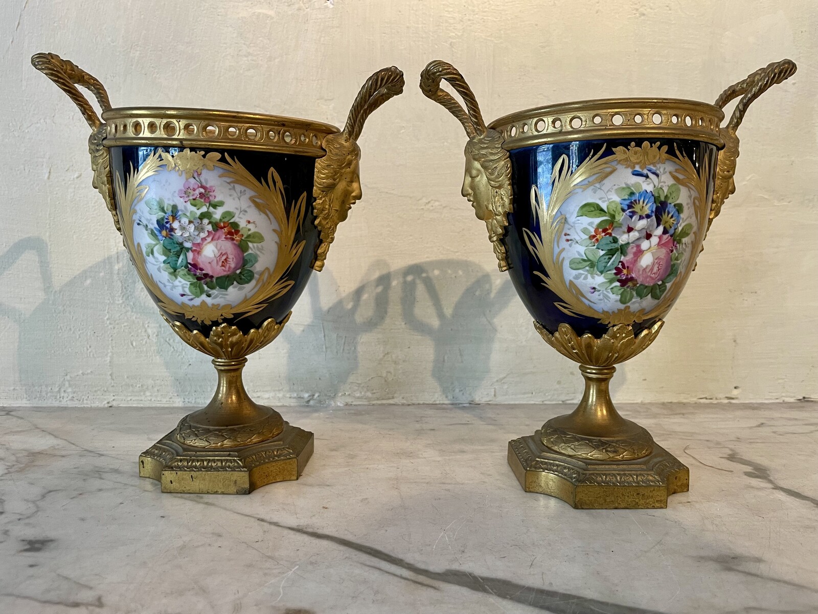 Pair of mounted vases in  Sevres style with floral decoration and gallant scenes