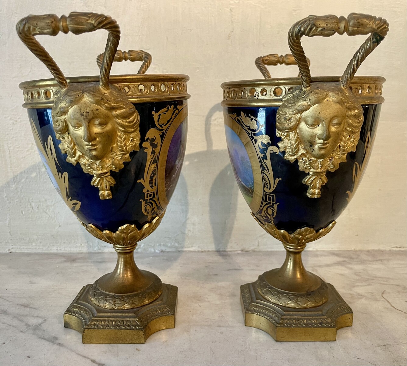 Pair of mounted vases in  Sevres style with floral decoration and gallant scenes