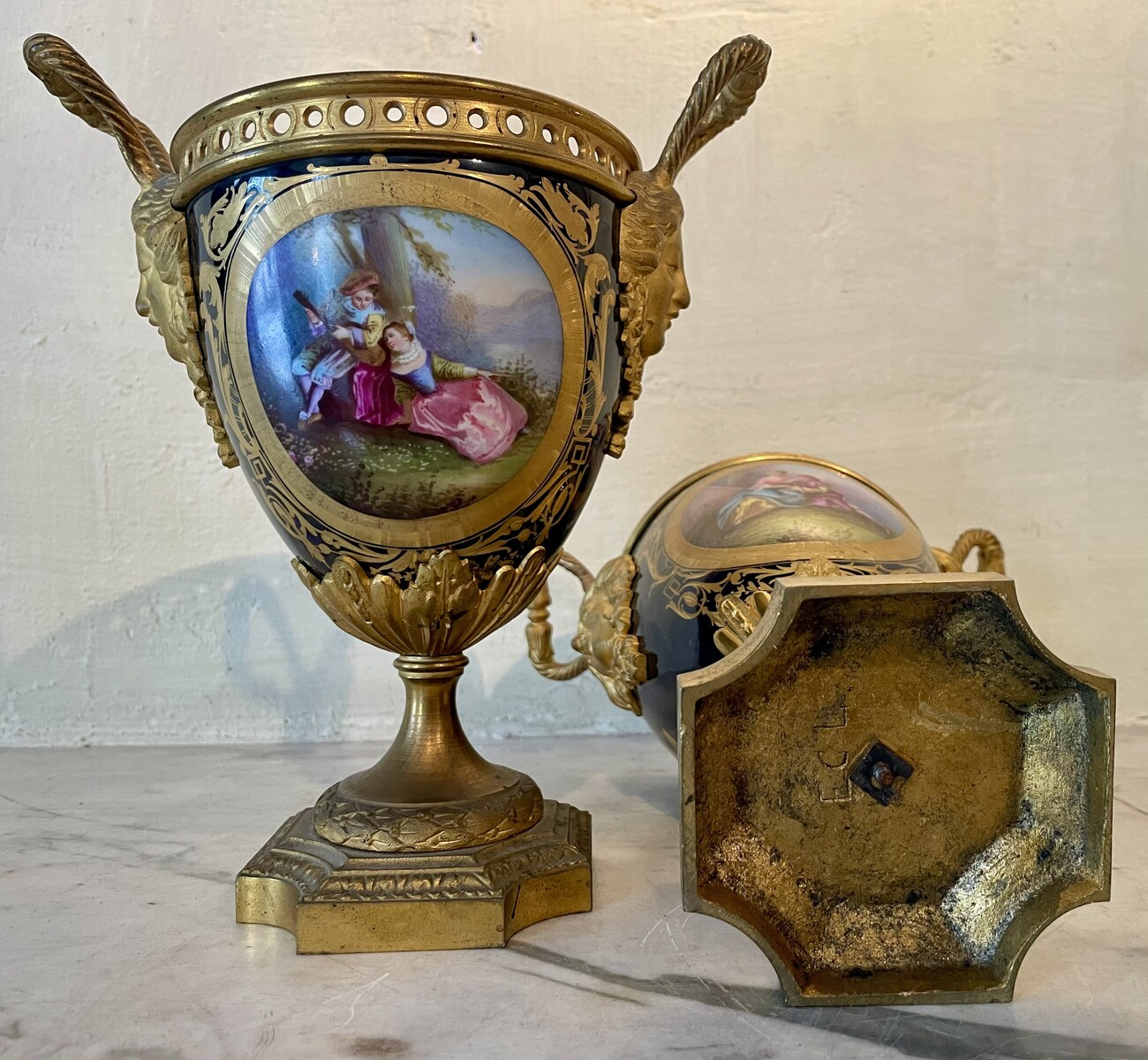 Pair of mounted vases in  Sevres style with floral decoration and gallant scenes