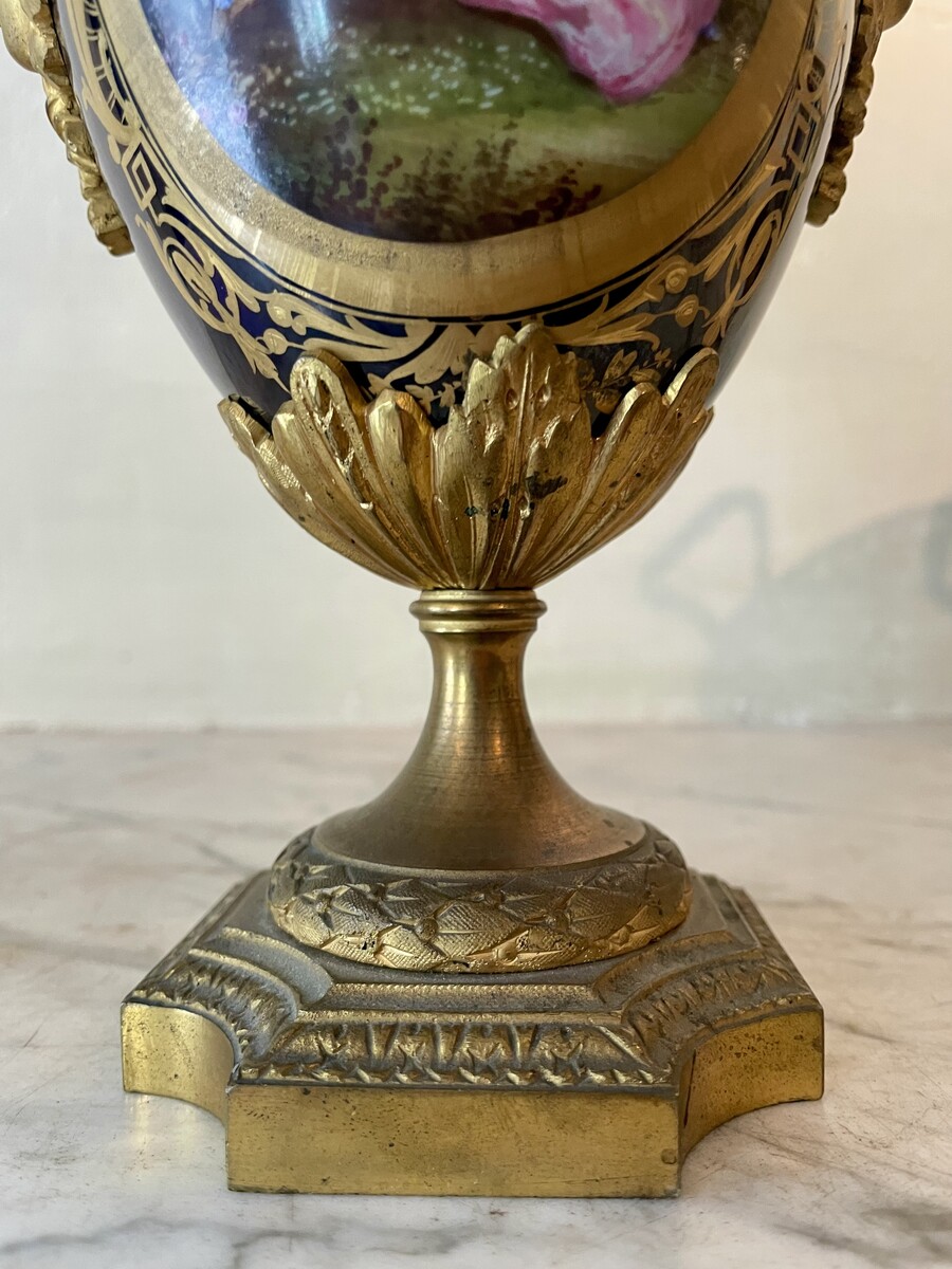 Pair of mounted vases in  Sevres style with floral decoration and gallant scenes
