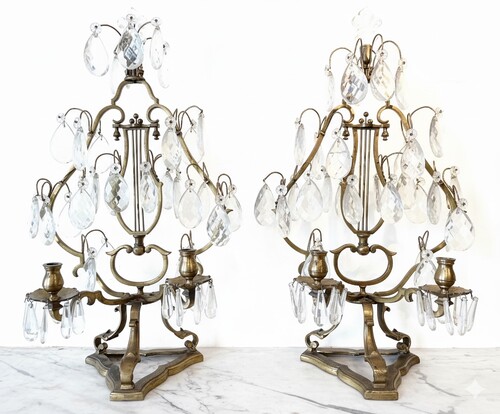 Pair of Régence style girandoles with lyre decoration