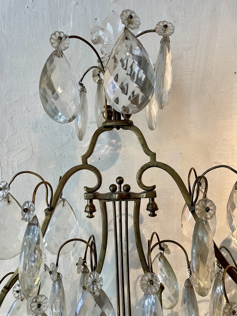 Pair of Régence style girandoles with lyre decoration