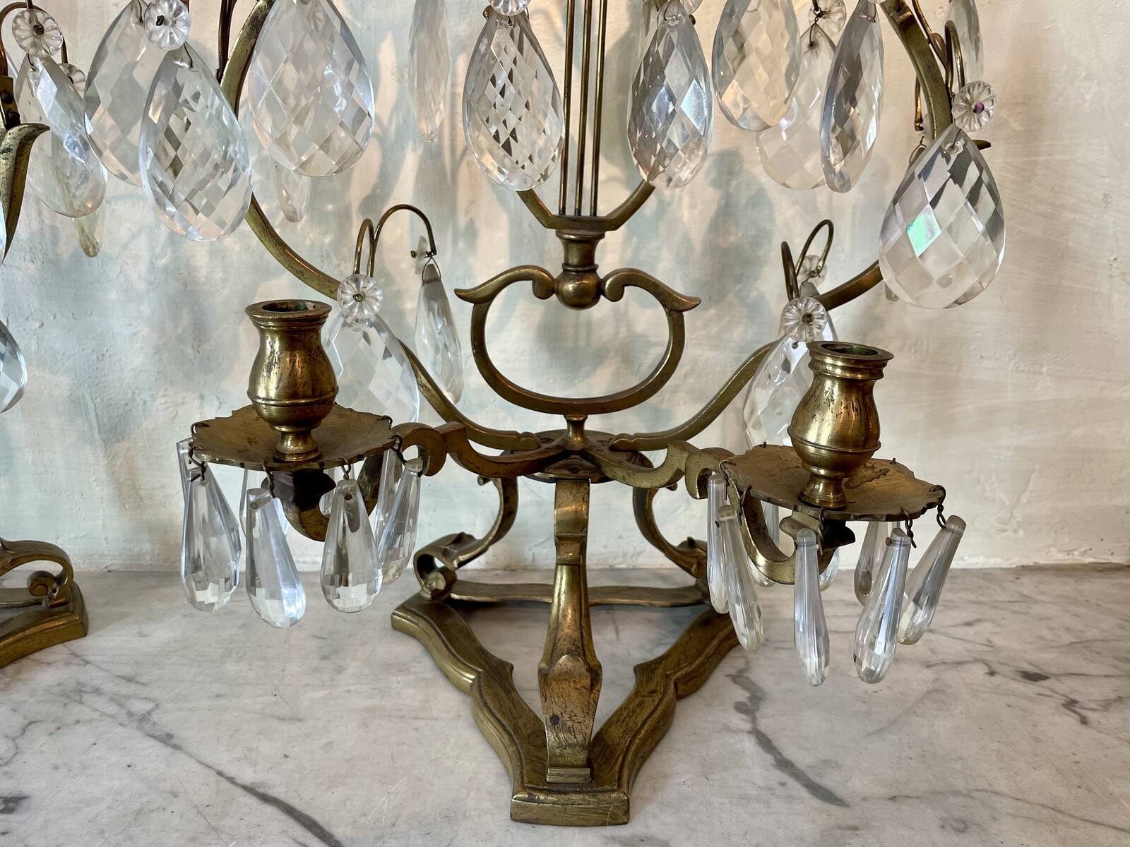 Pair of Régence style girandoles with lyre decoration