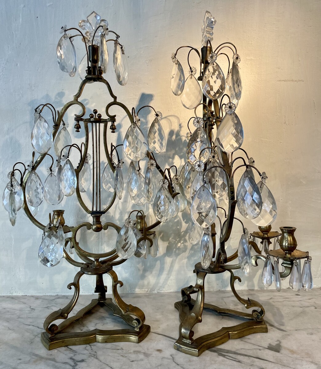 Pair of Régence style girandoles with lyre decoration