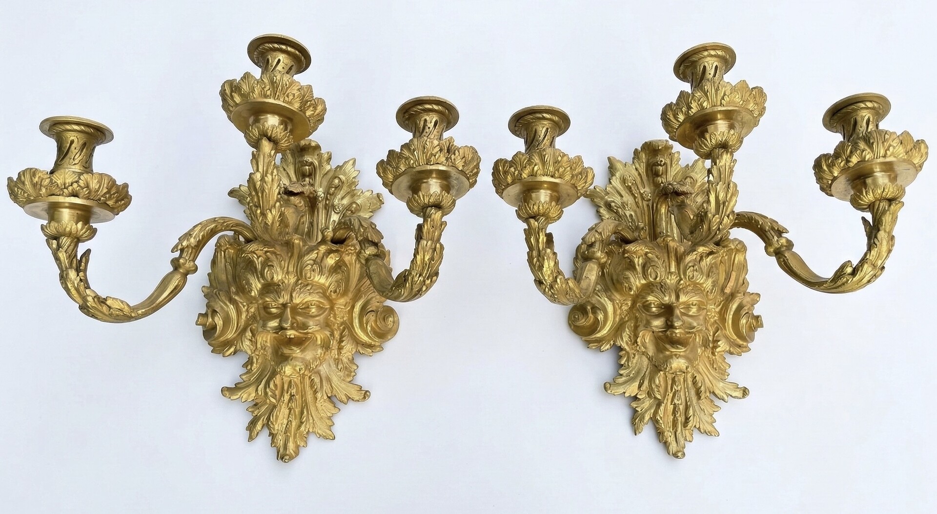 Pair of three-lights Regence style sconces