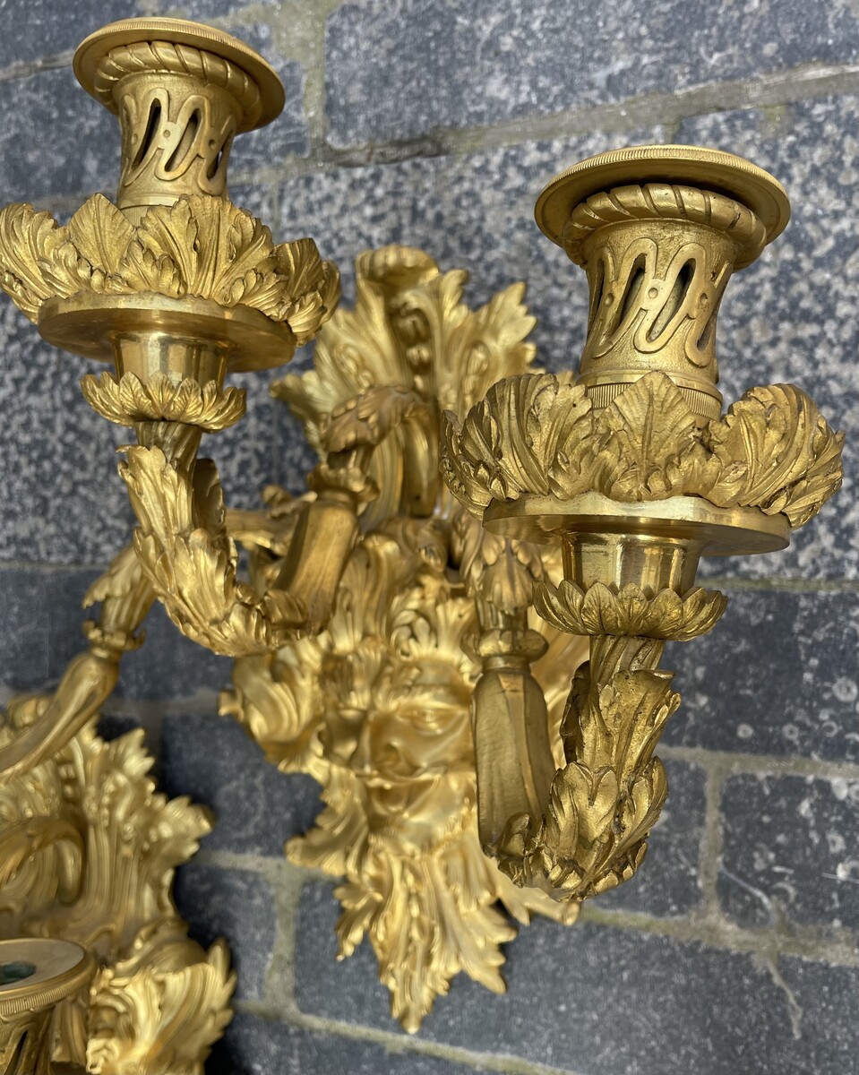 Pair of three-lights Regence style sconces