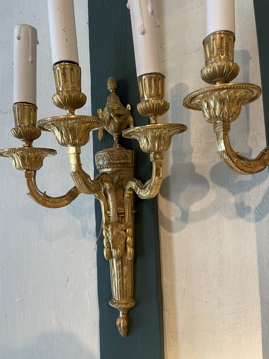 Pair of three-lights sconces in Louis XVI style