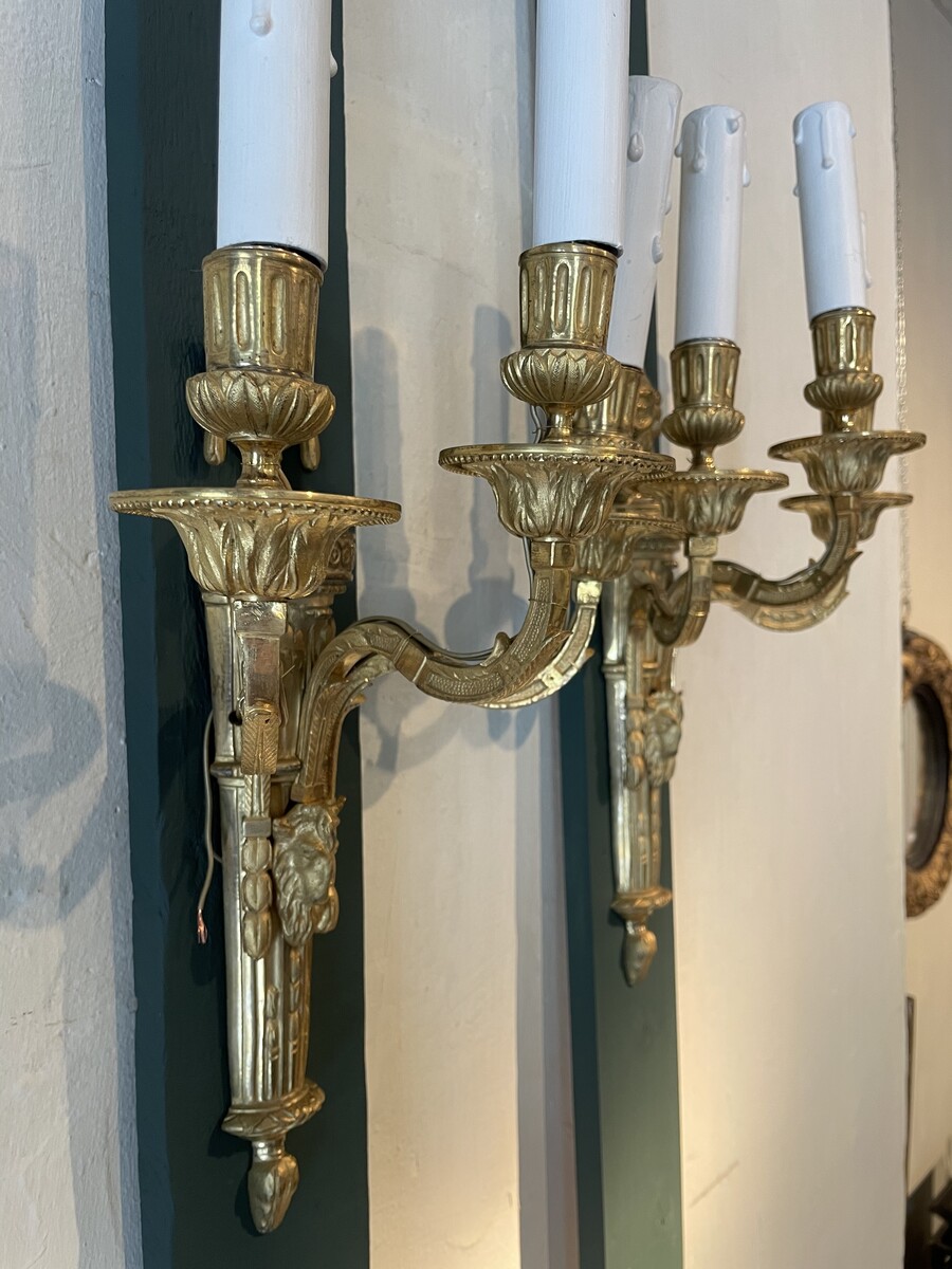 Pair of three-lights sconces in Louis XVI style