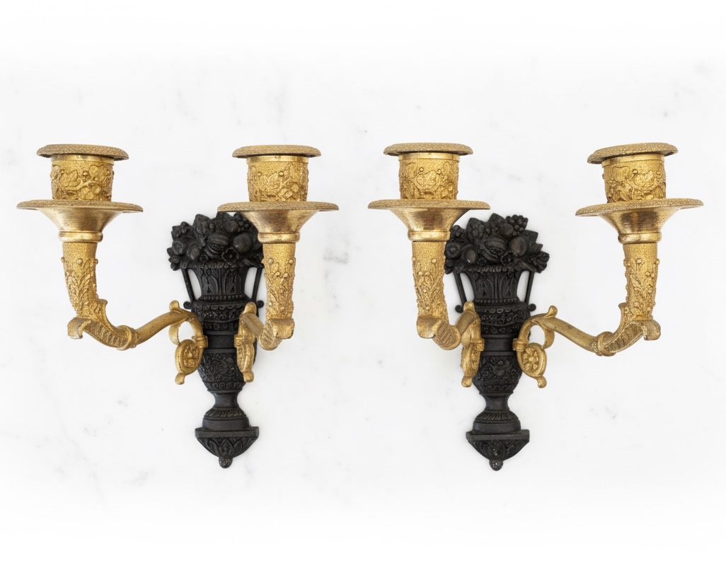 Pair of wall lights with two arms of light decorated with garnished basins