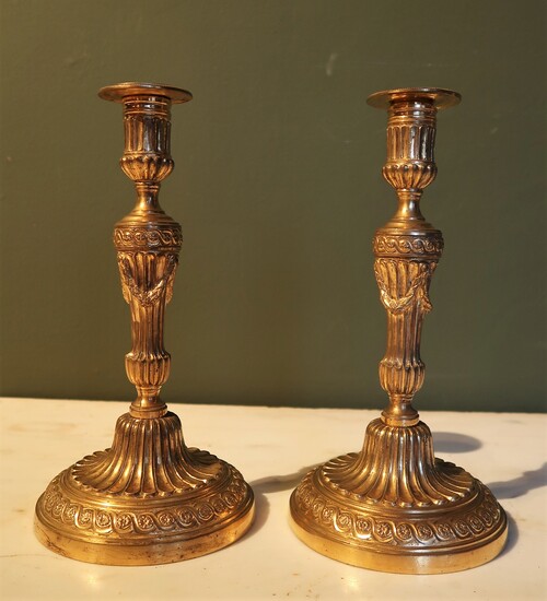 Pait of signed 18th century candelholders