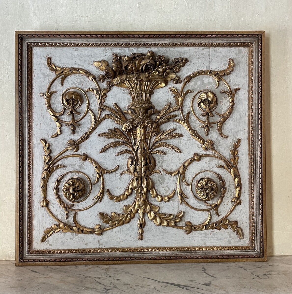 Panel decorated with rinceaux in low relief, in Louis XVI style