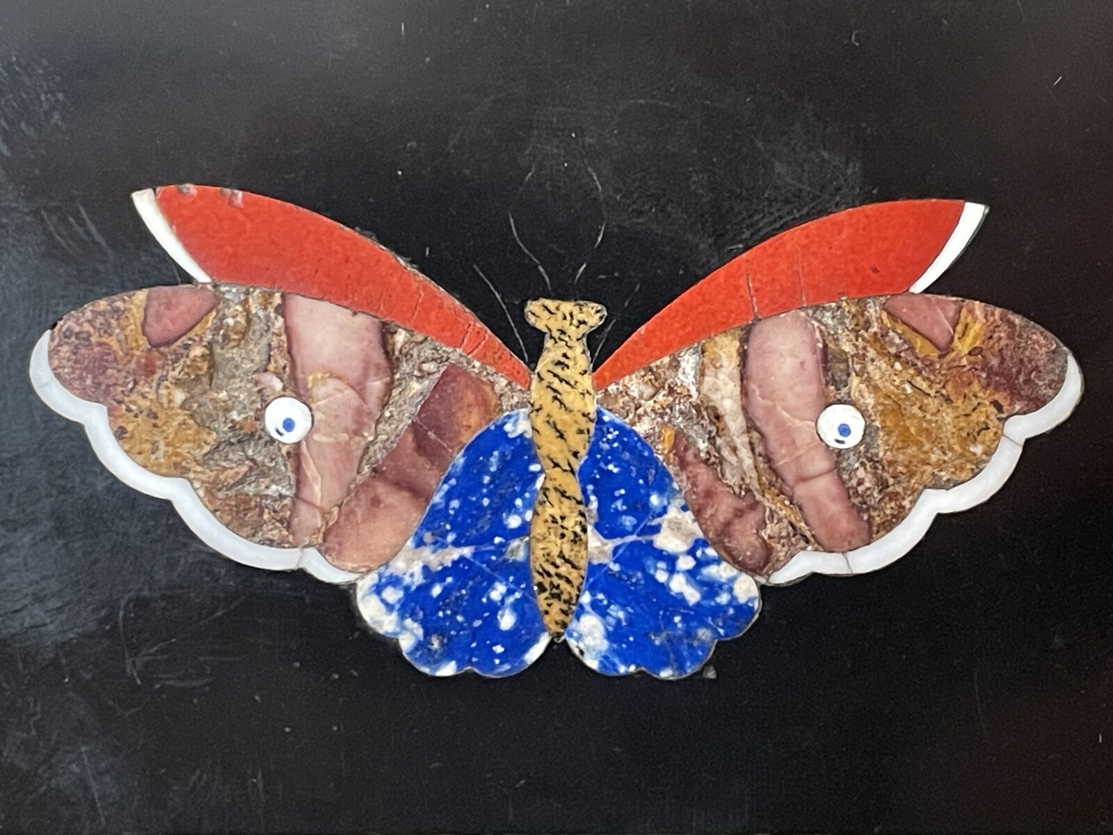 Plaque with inlaid decoration of a butterfly